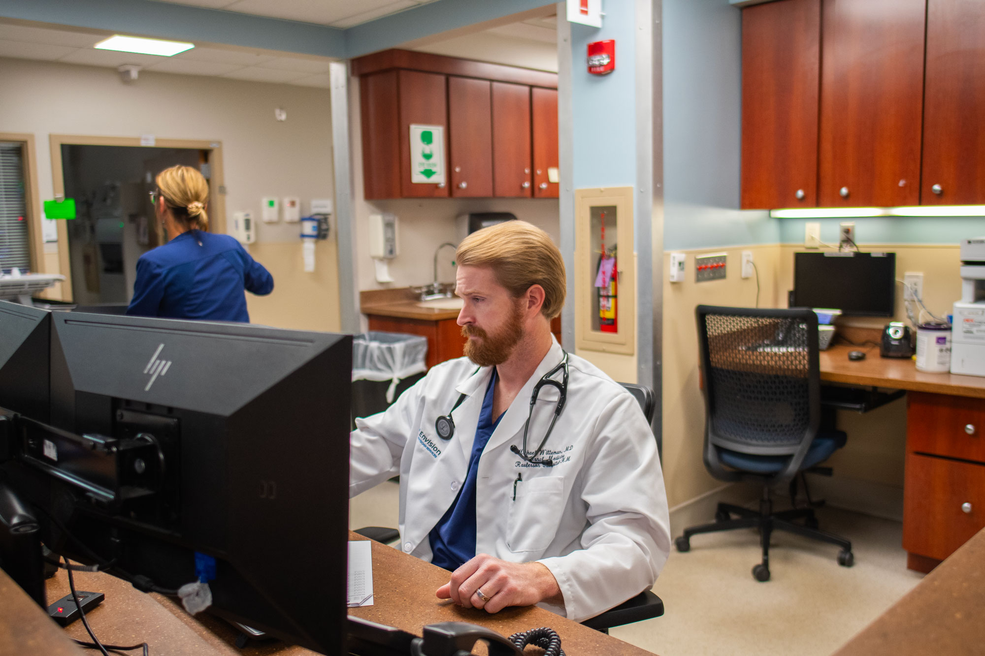 doctor working at computer